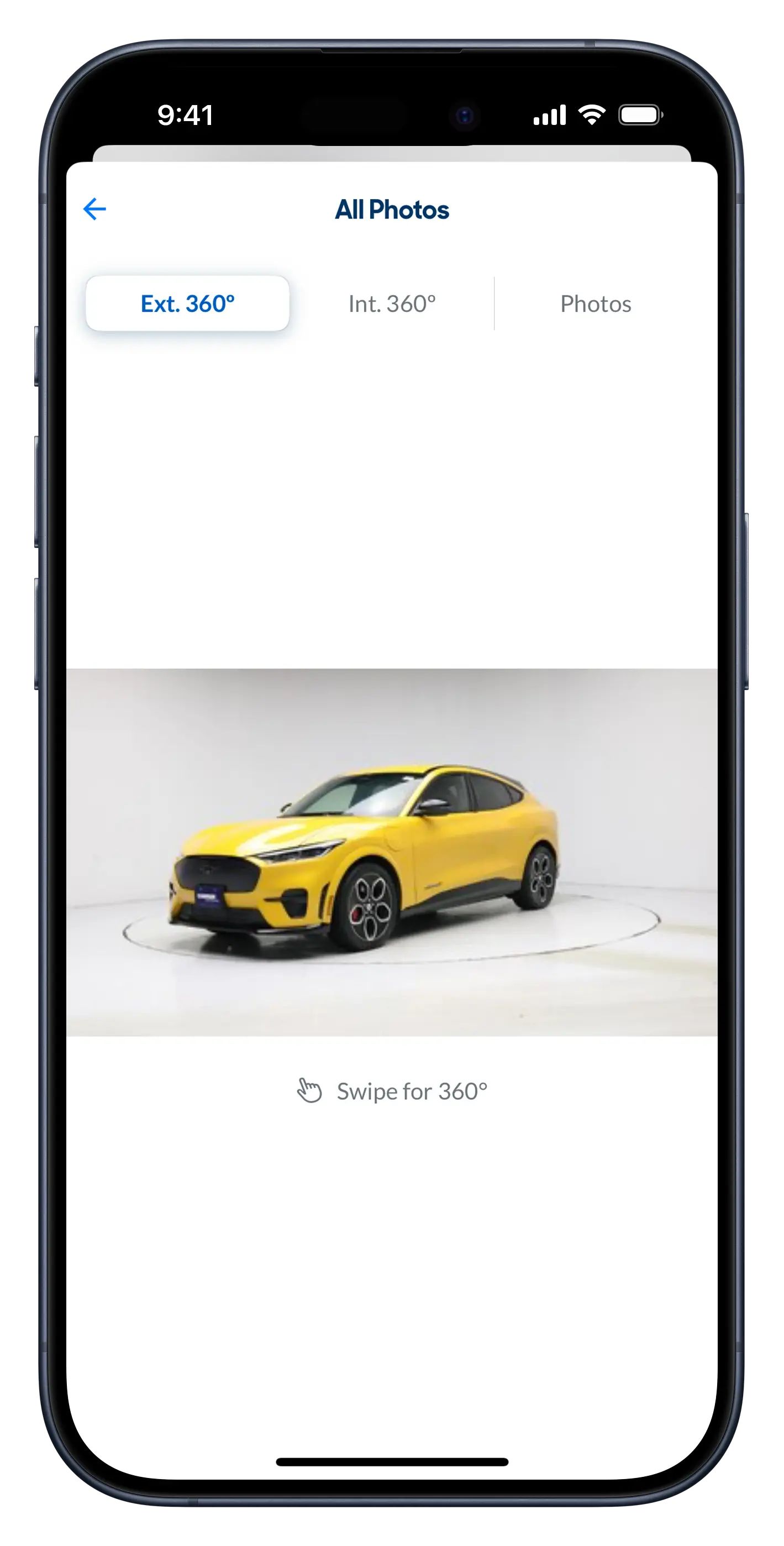 Screenshot of the CarMax app vehicle detail screen, displaying a yellow Ford Mustang Mach-E in a white room. A label is displayed beneath that reads, 'Swipe for 360º'.